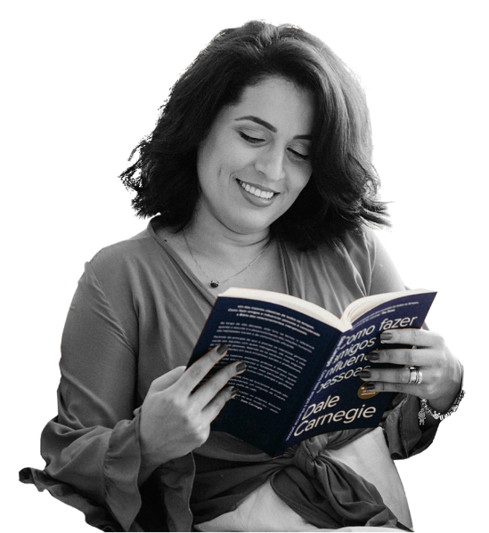 A klib reader with a physical book delivered to their workplace desk